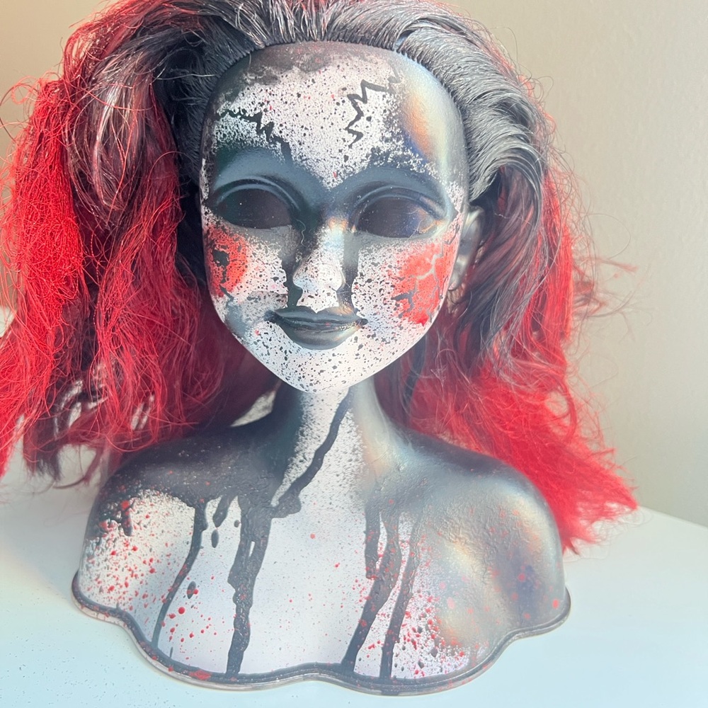 Creepy upcycled Mannequin Head with Red and Black Design
